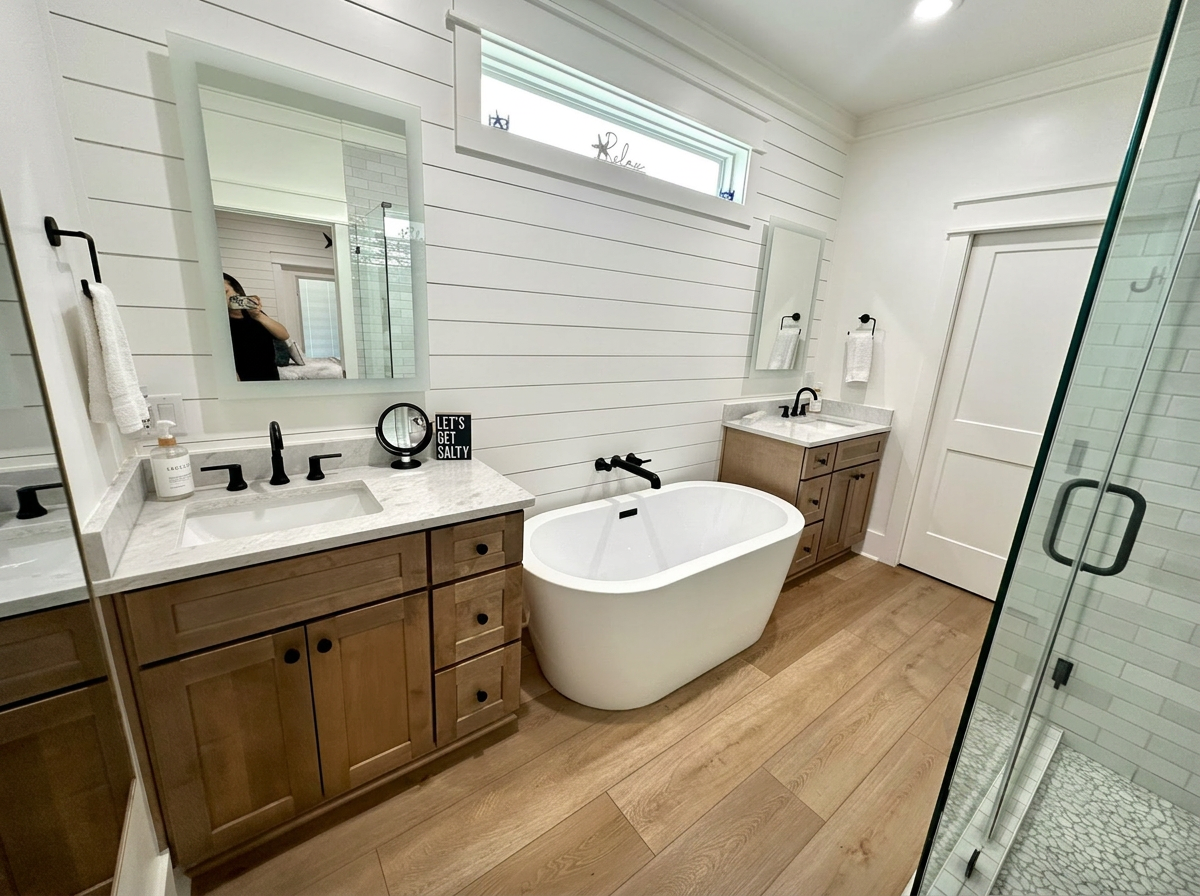 Coastal master bathroom with freestanding tub, freshly cleaned